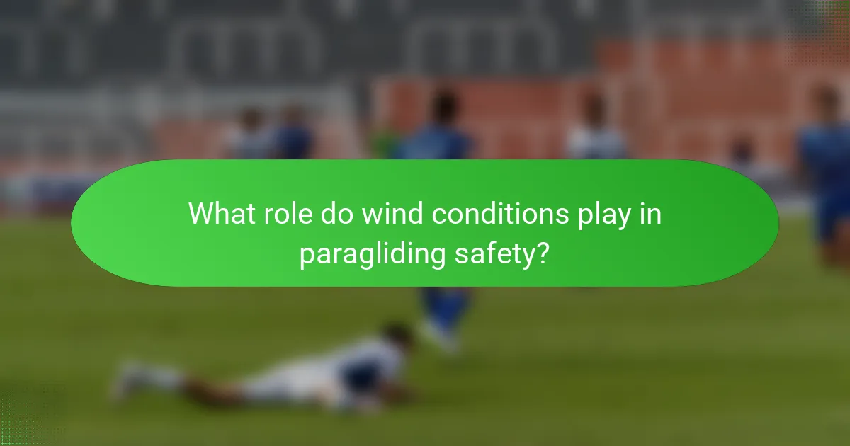 What role do wind conditions play in paragliding safety?